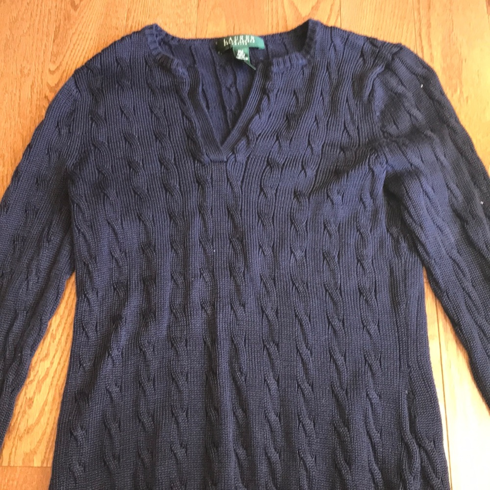 Navy blue ribbed sweater.